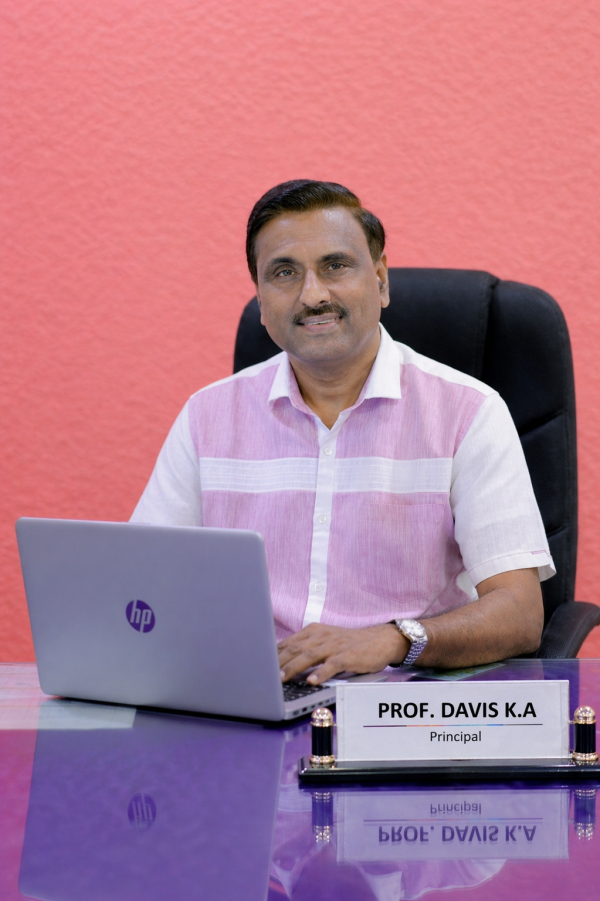 Prof. Davis K A - Principal, Elims College